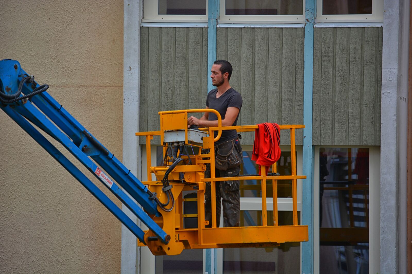 Nikon D5200 sample photo. Facade, homme, nacelle, ouvrier photography