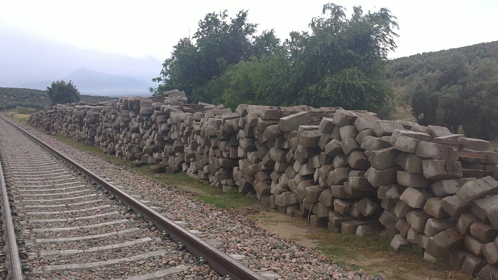Sony Ericsson U5i sample photo. Train, sleepers, excavator photography