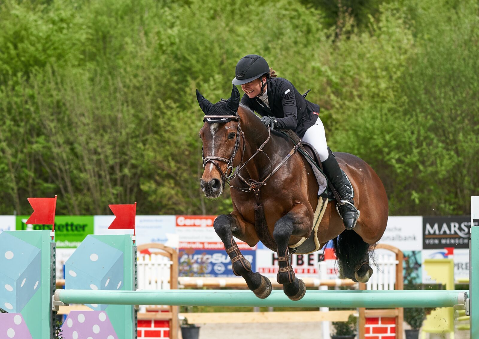 Sony FE 100-400mm F4.5-5.6 GM OSS sample photo. Horse jumping, competition, obstacle photography