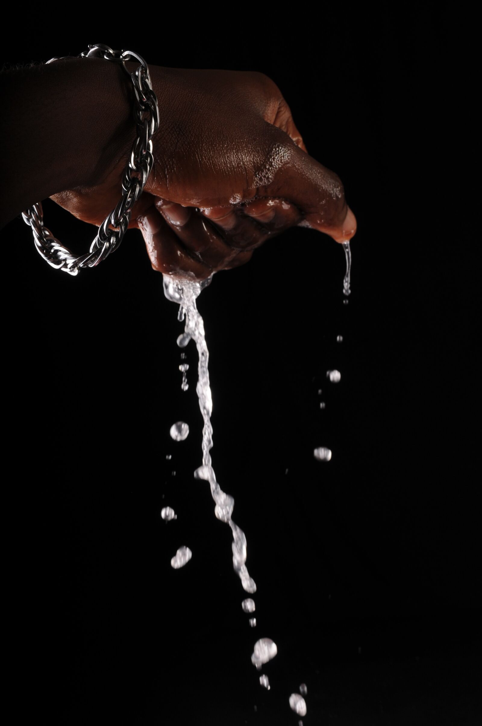 Nikon D300S sample photo. Water, slash, hand photography