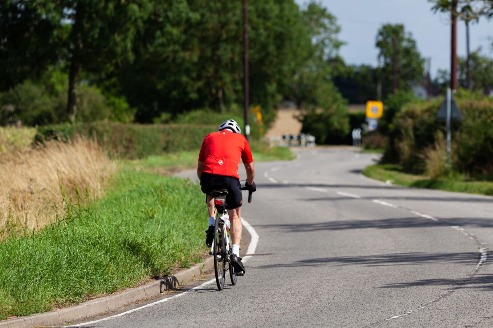150-600mm F5-6.3 DG OS HSM | Contemporary 015 sample photo. Bicycle, man riding on photography