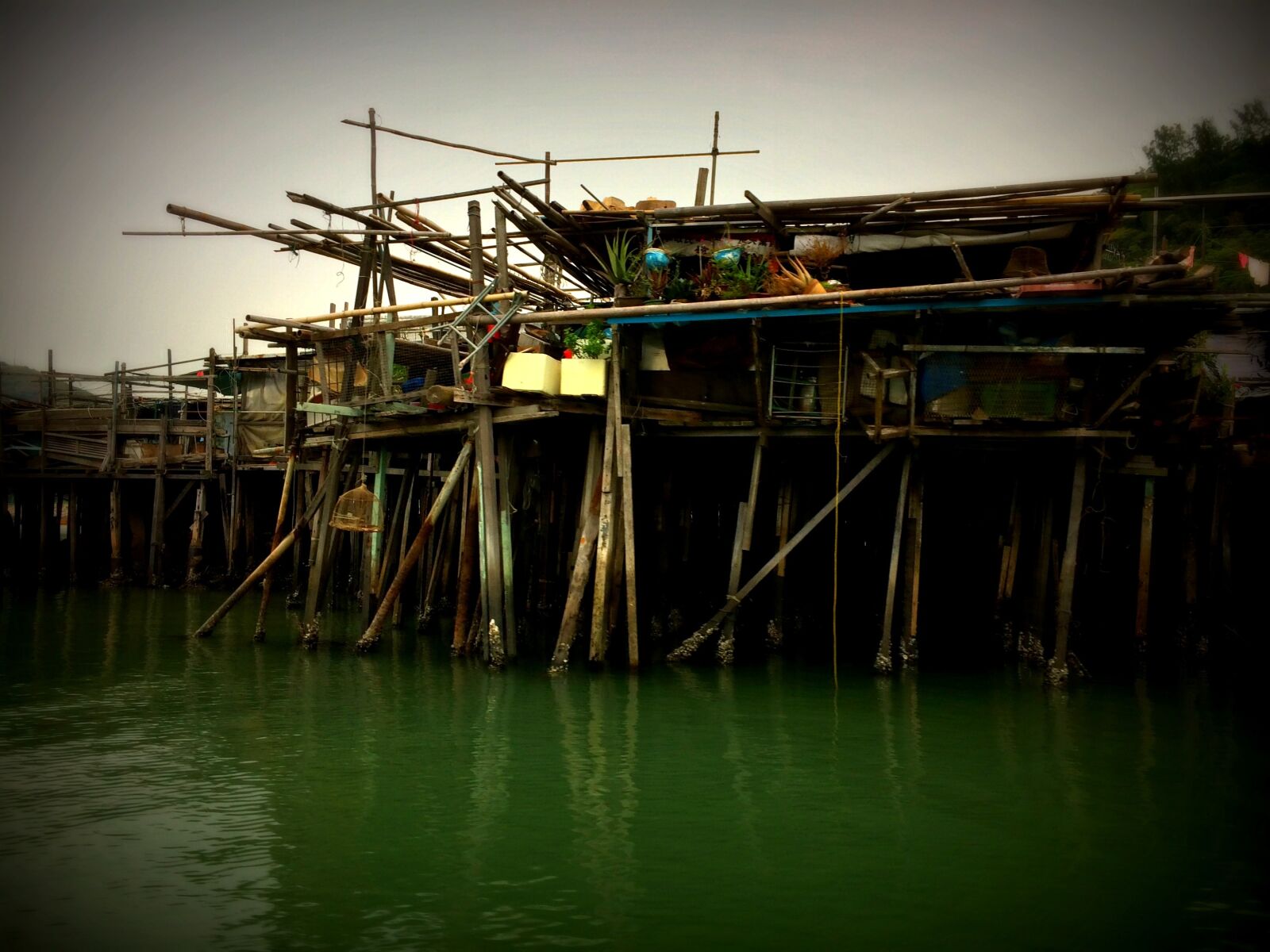 iPhone 5s back camera 4.12mm f/2.2 sample photo. Huts, village, river photography
