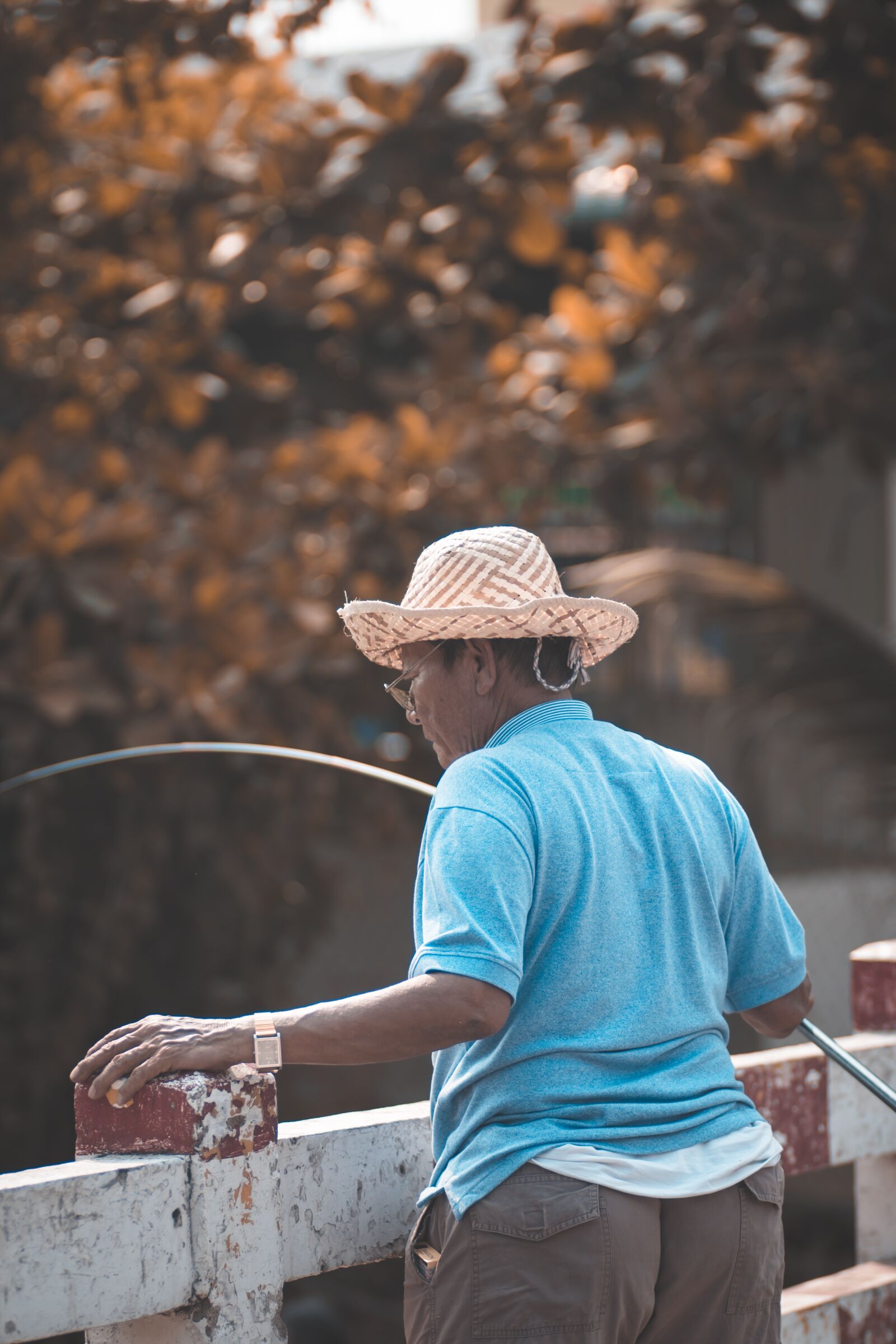 Canon EOS 80D + Canon EF 85mm F1.8 USM sample photo. Fishing, hats, conical leaf photography
