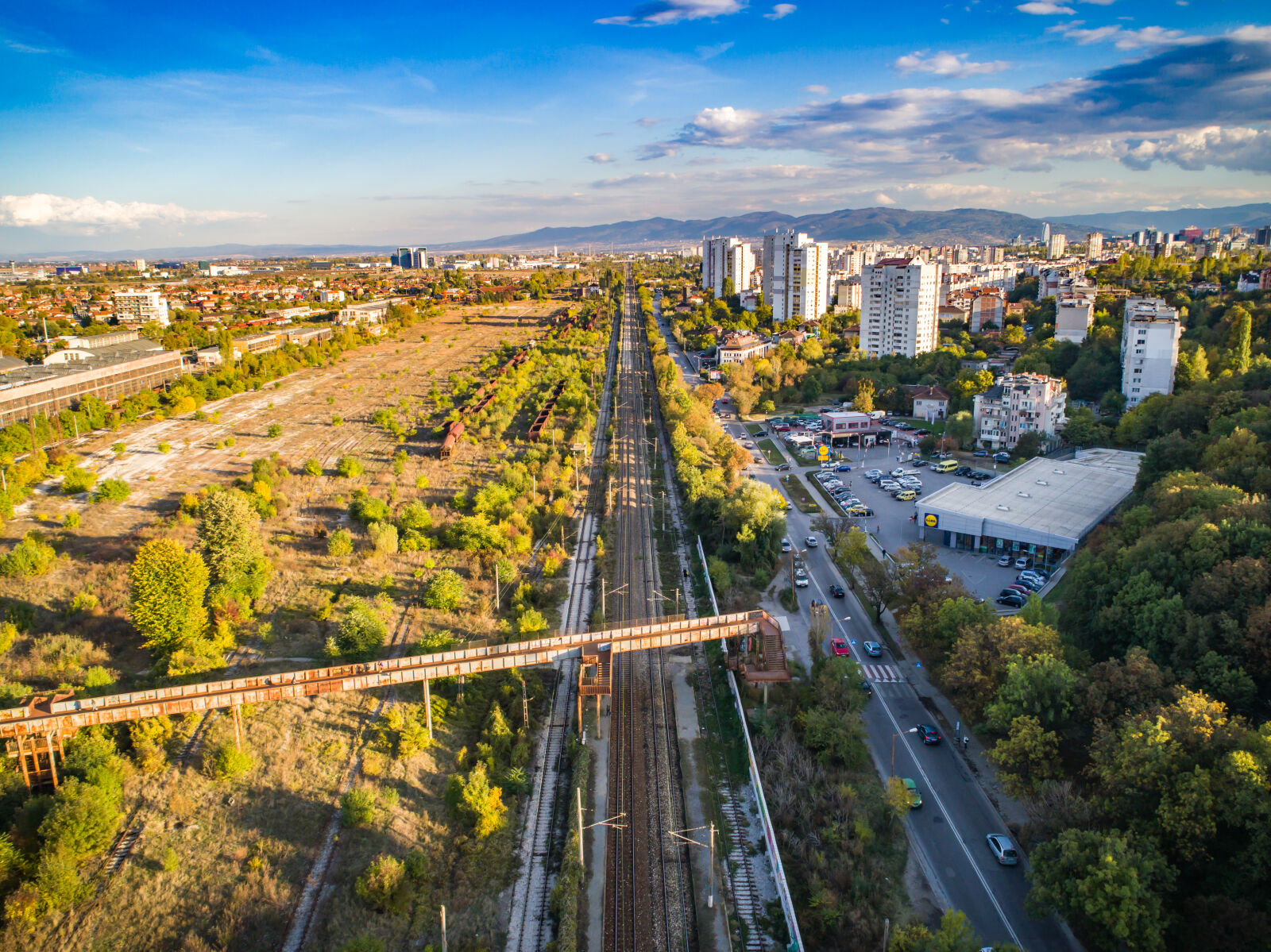 DJI FC6310 sample photo. Apartment, buildings, autumn, blue photography