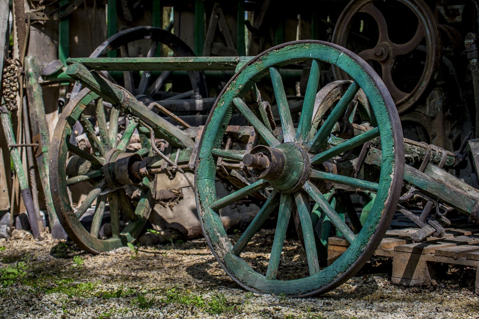 Nikon D3100 sample photo. Wheel, barn, rustic photography