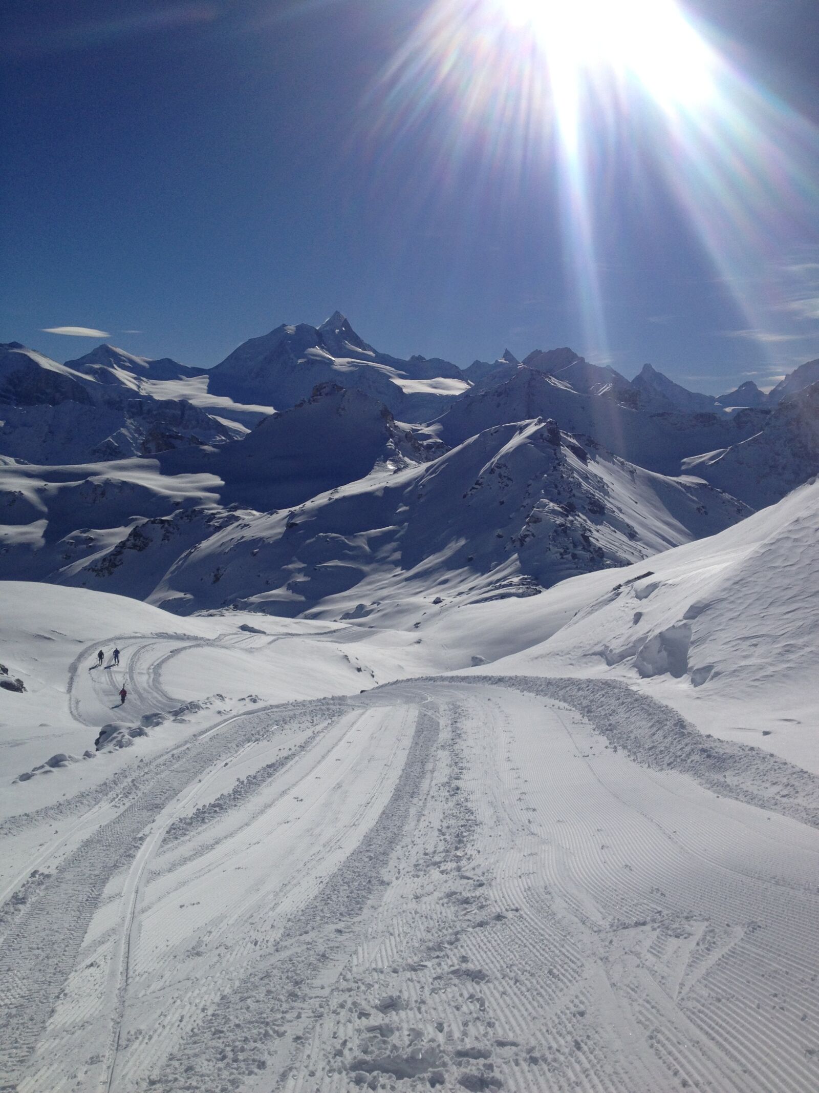 iPhone 4S back camera 4.28mm f/2.4 sample photo. Alps, ski, sun photography