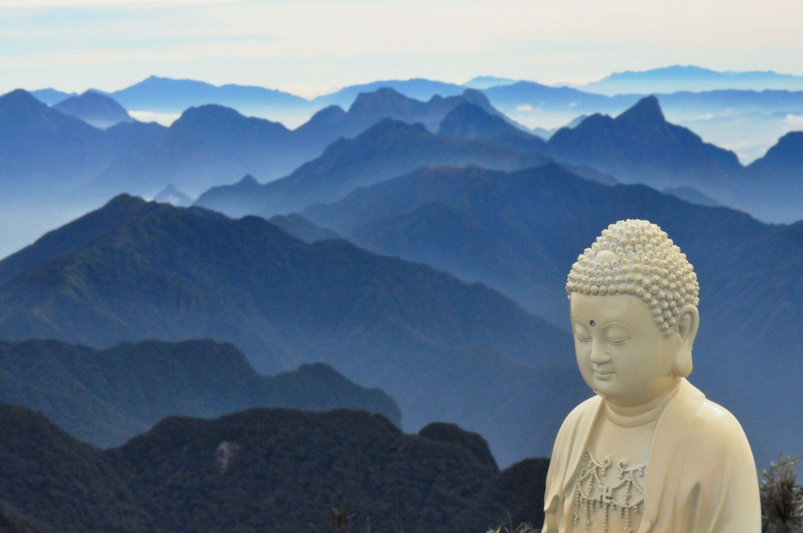 Nikon D5000 sample photo. Buddha, mountains, blue photography