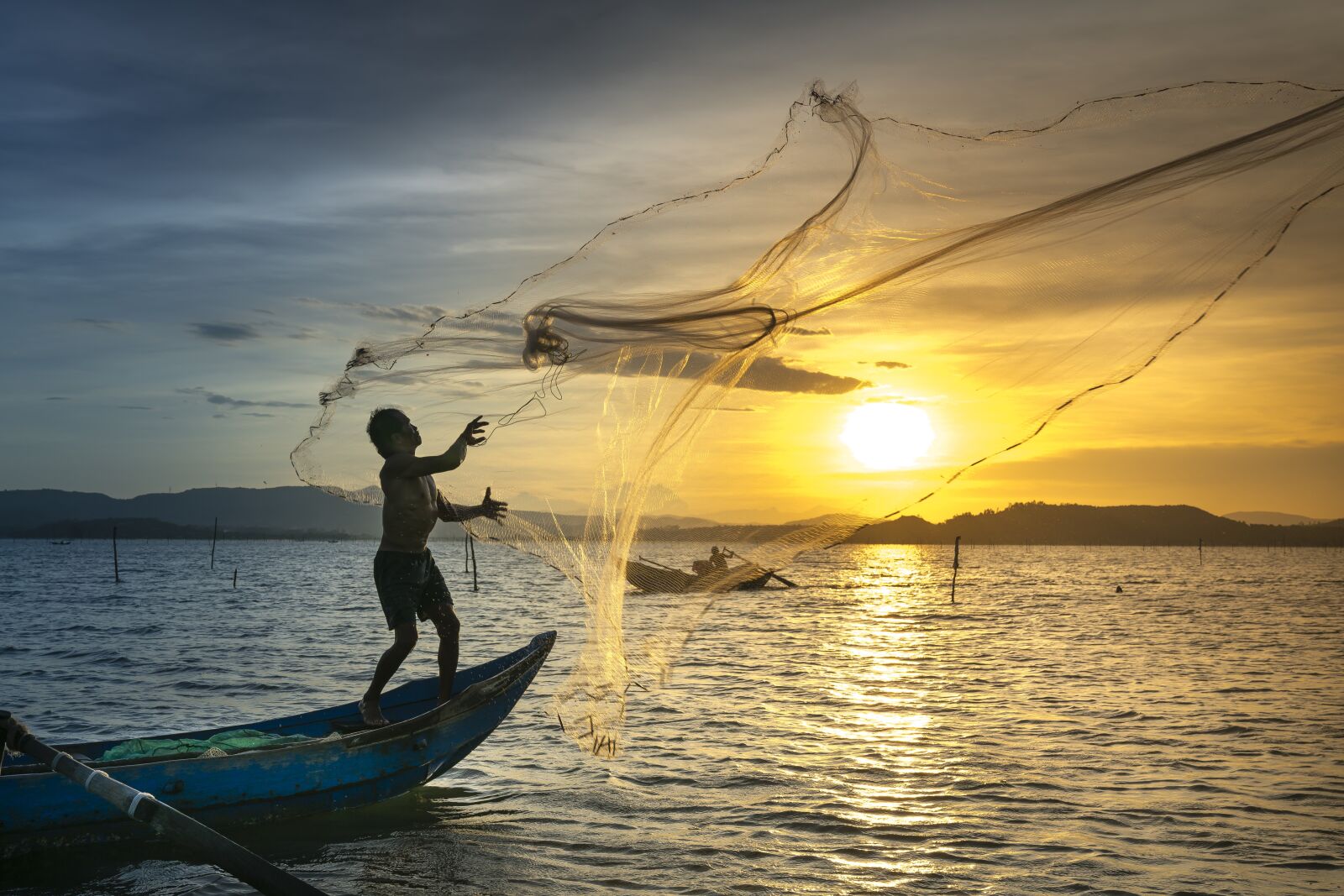 Sony a7R II + Sony FE 24-70mm F2.8 GM sample photo. Fish, fishermen, fishing net photography