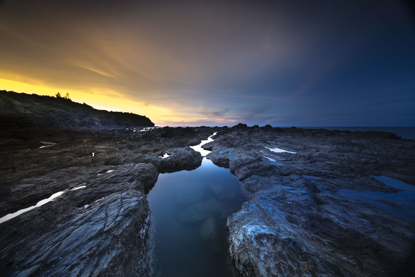 Voigtlander ULTRA WIDE-HELIAR 12mm F5.6 III sample photo. Volcanic rock, coral, adventure photography