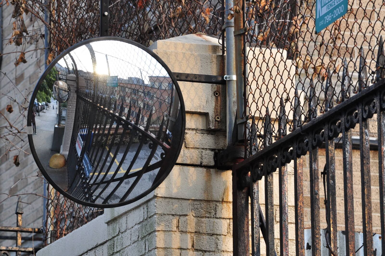 Nikon D90 sample photo. Mirror, fences, security photography