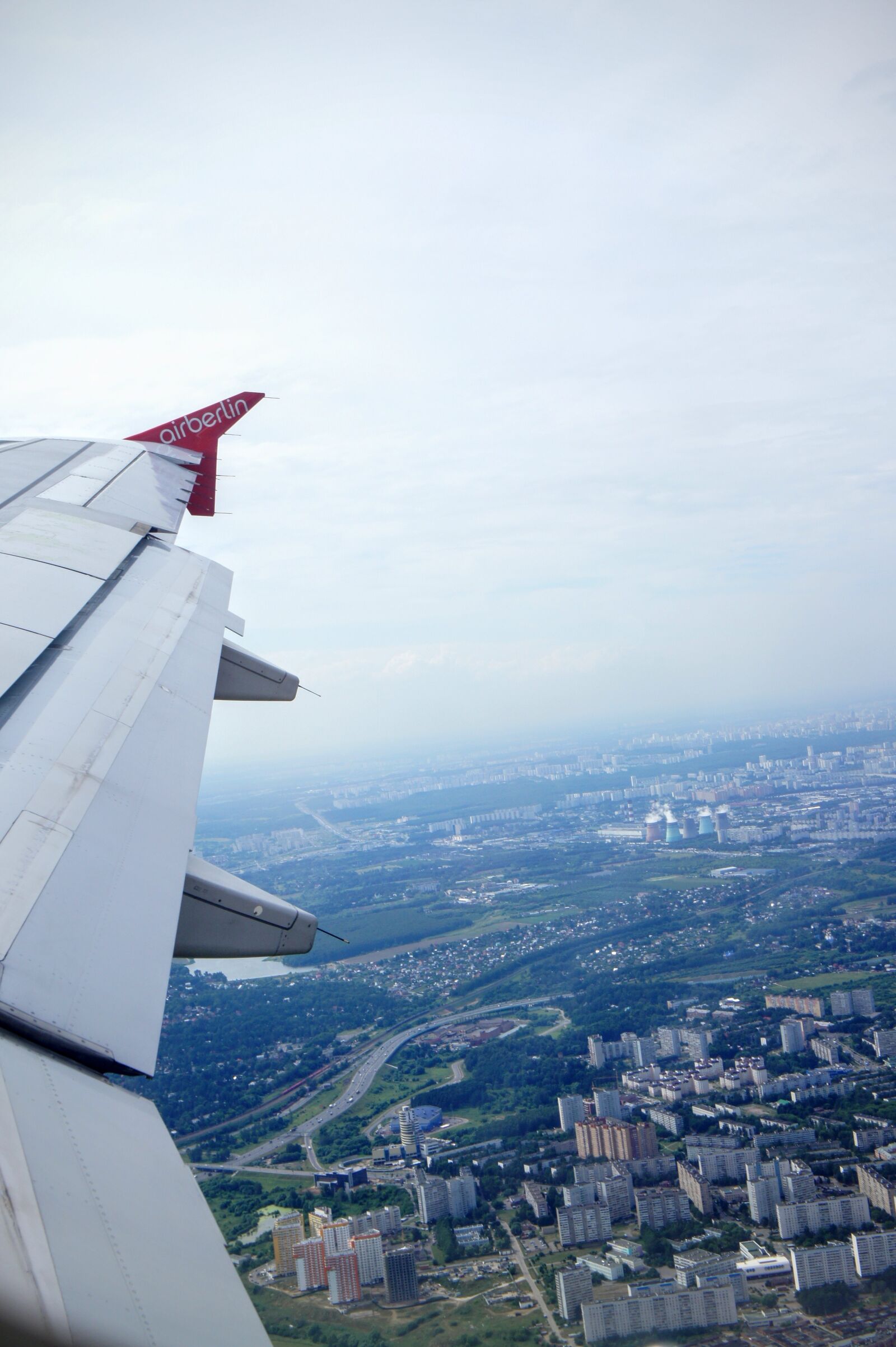 Sony Alpha NEX-5 + Sony E 18-55mm F3.5-5.6 OSS sample photo. Aircraft, wing, sky photography