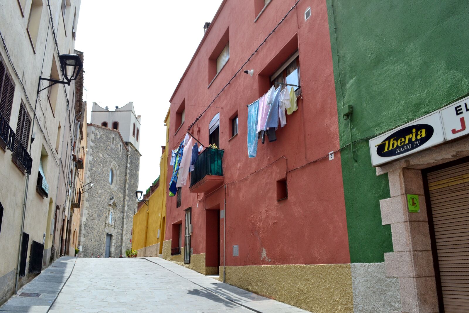 Nikon D3100 sample photo. Street, linen, colorful houses photography