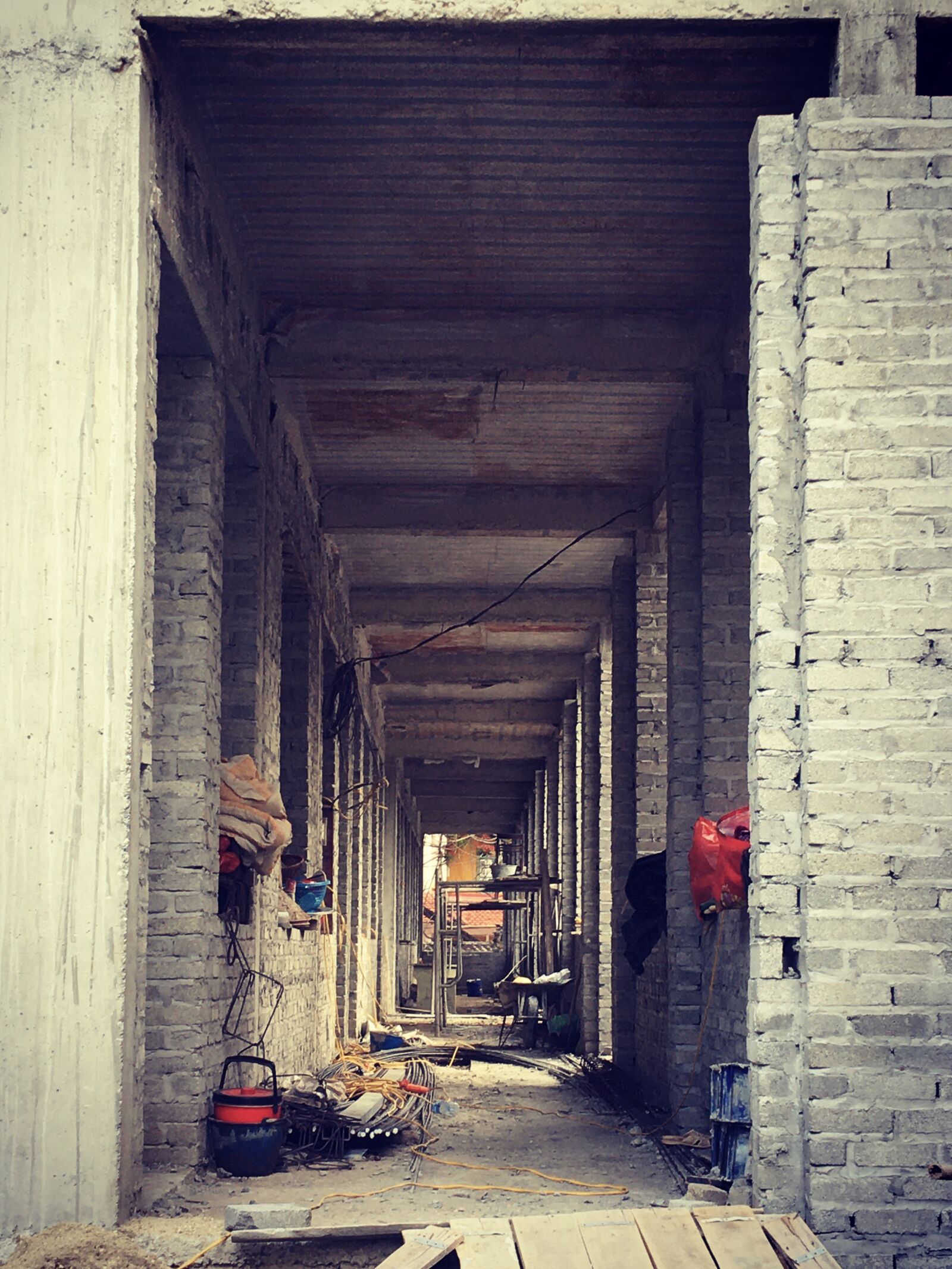 iPhone 6s back camera 4.15mm f/2.2 sample photo. Brick, build, corridor photography