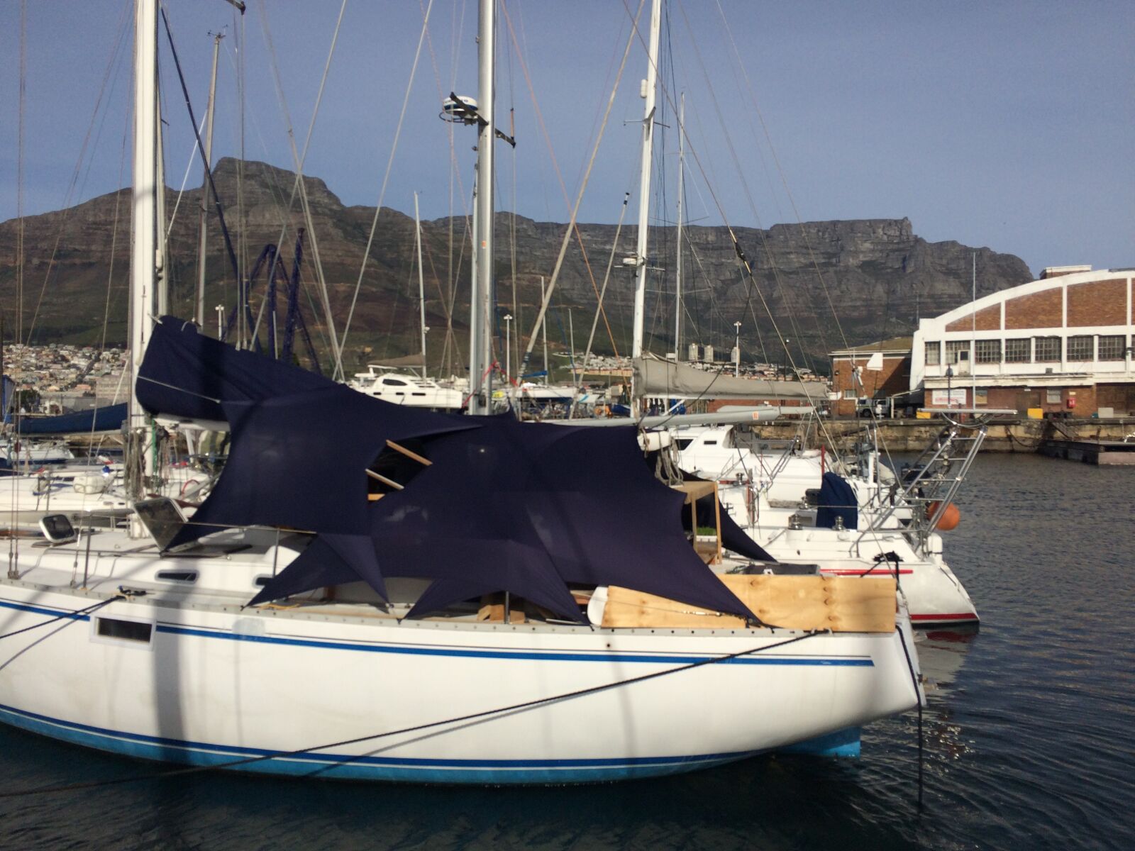 iPhone 5s back camera 4.15mm f/2.2 sample photo. Boats, mountains, sea photography