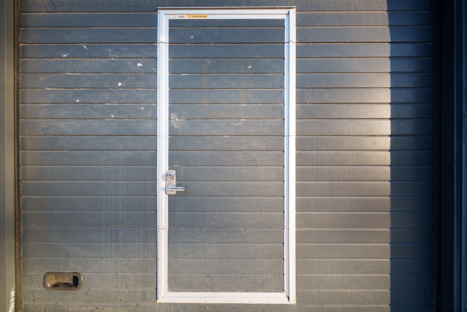 Sigma 14mm F1.4 DG DN sample photo. Loading dock door photography