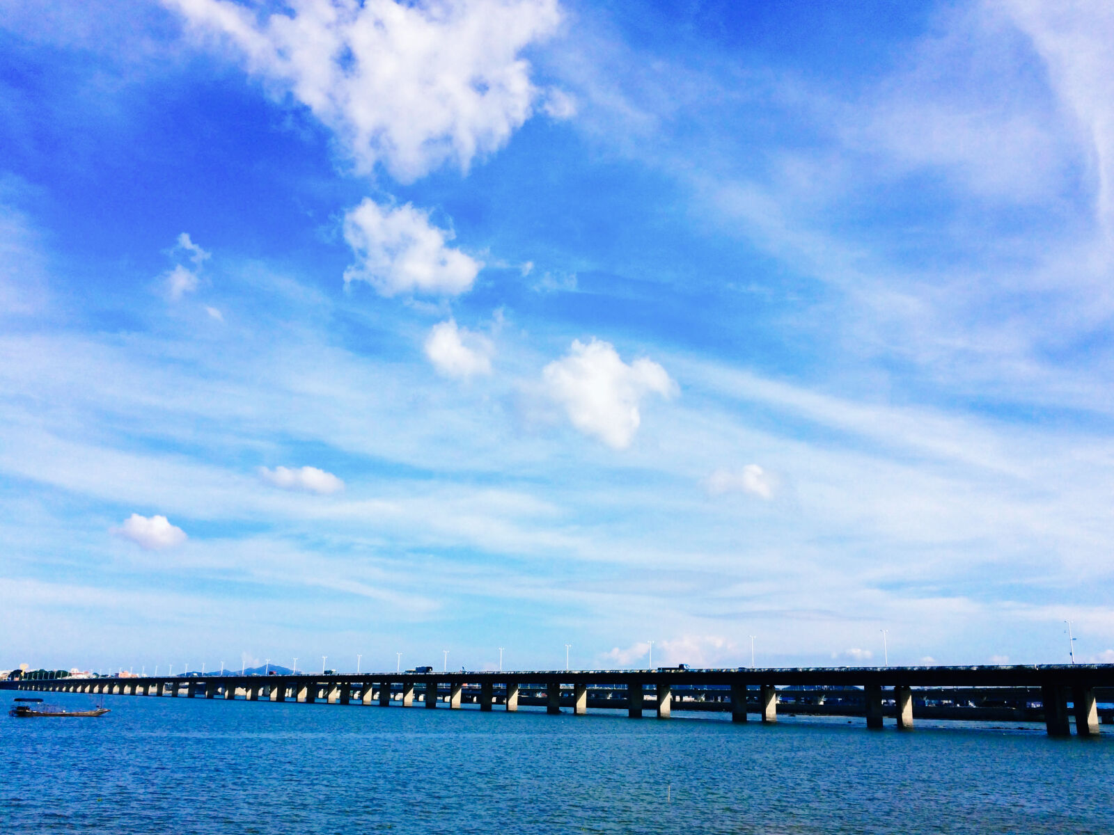 iPhone 5s back camera 4.15mm f/2.2 sample photo. Blue, blue, sky, clouds photography