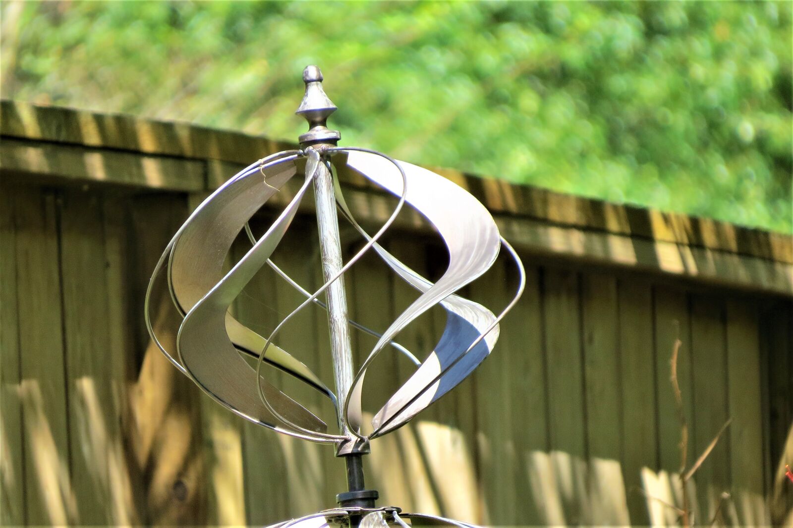 Canon PowerShot SX50 HS sample photo. Yard art, wind toy photography