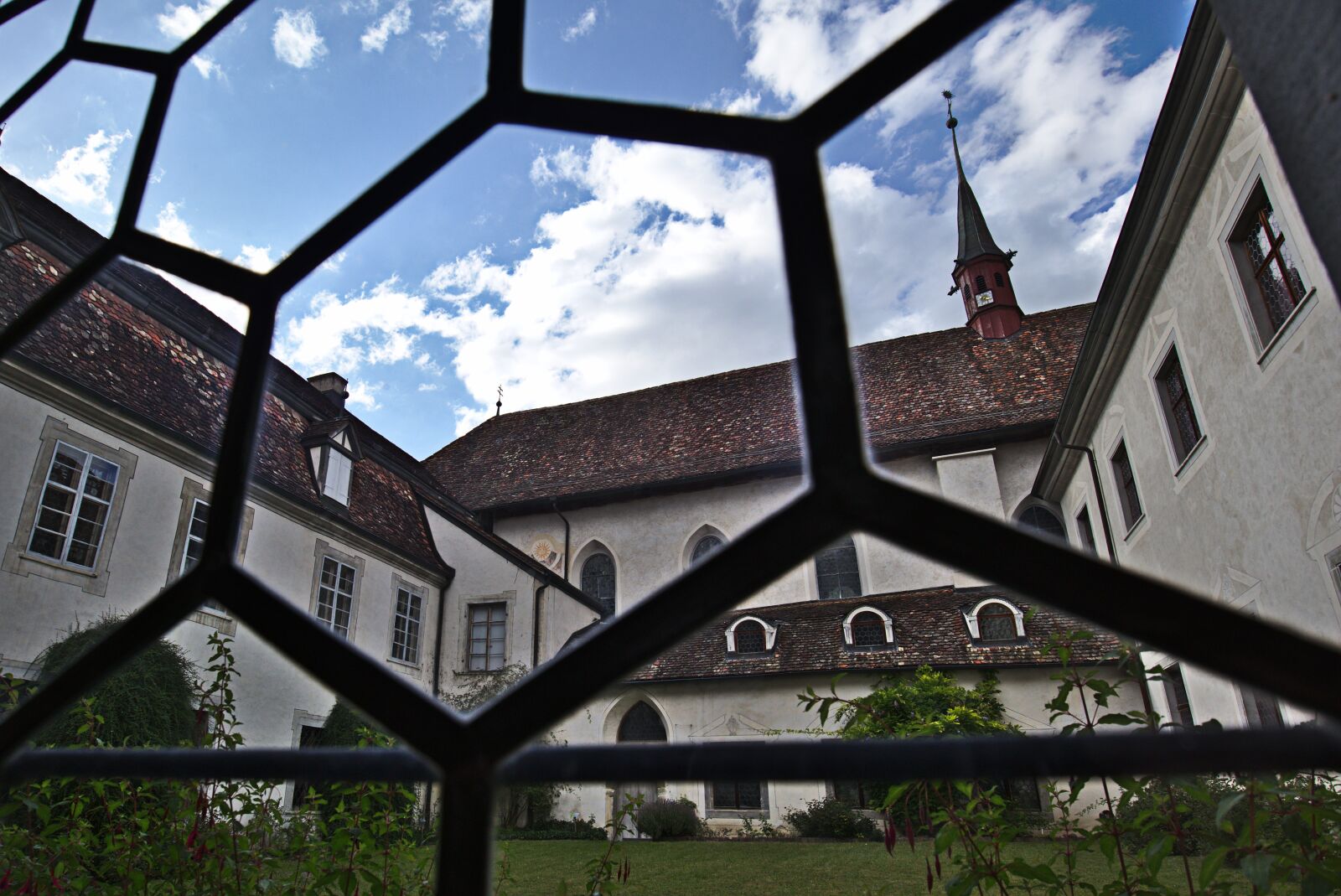 Canon EF-M 11-22mm F4-5.6 IS STM sample photo. Monastery, window, sky photography