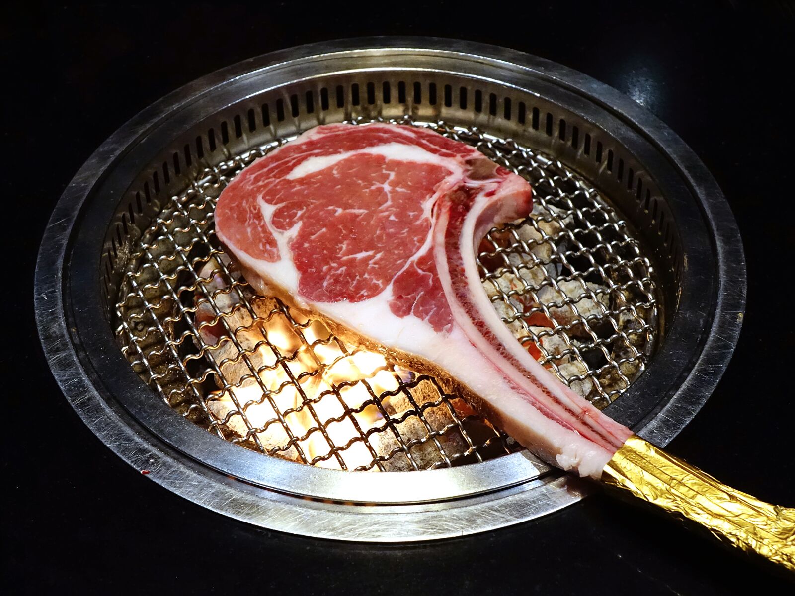 Sony Cyber-shot DSC-RX10 sample photo. Tomahawk steak, barbecue, bone-in photography
