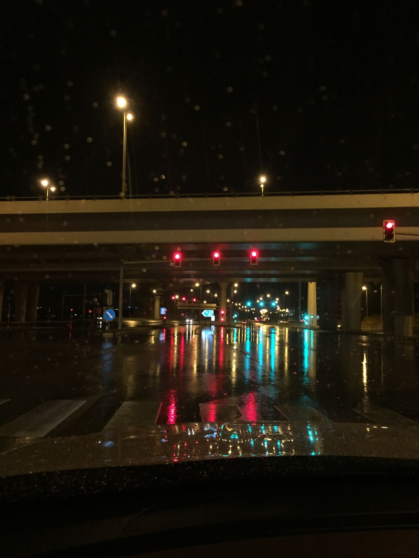 iPhone 6 back camera 4.15mm f/2.2 sample photo. Road, lights, rain photography