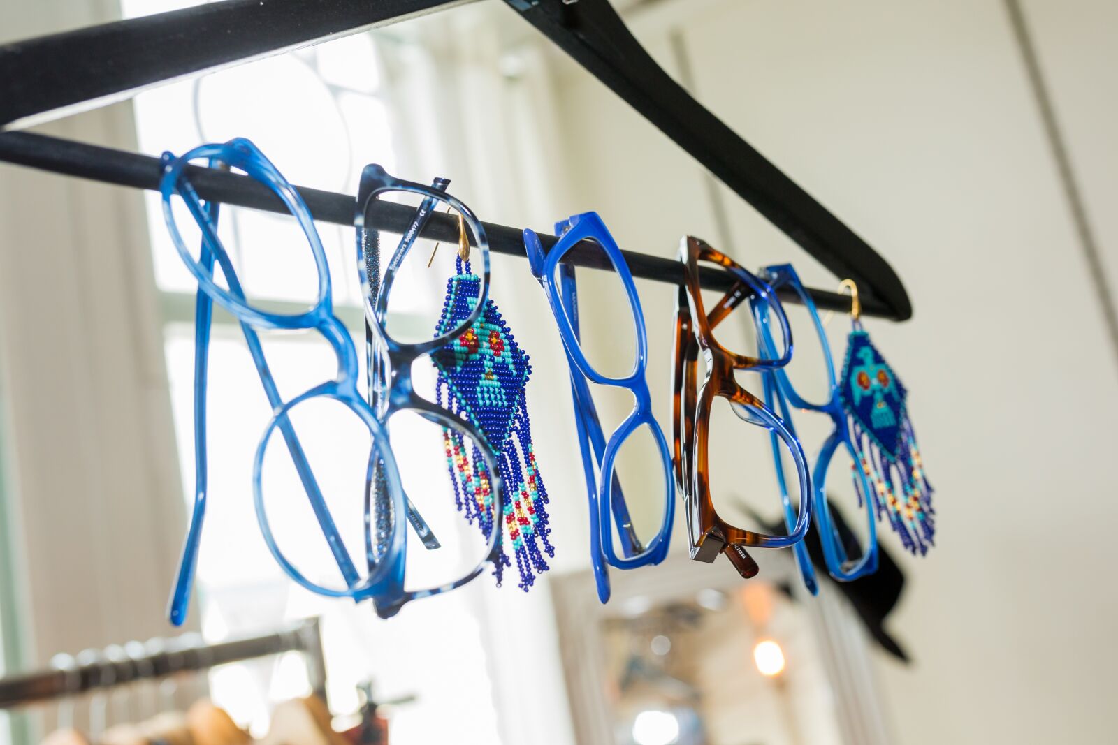 Canon EOS 5D Mark III sample photo. Blue, glasses, clothing-rack photography