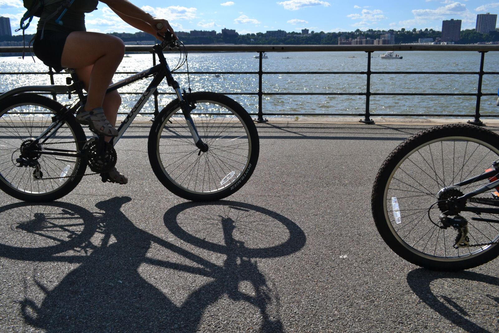 Nikon D3100 sample photo. Bikes, bike riding, riverside photography