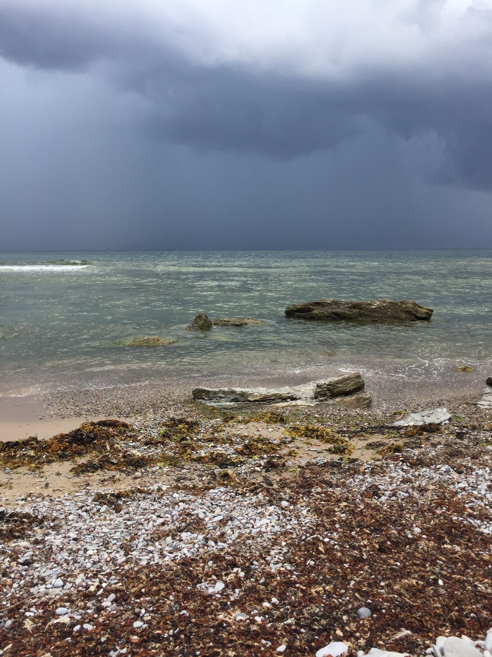 iPhone 6 back camera 4.15mm f/2.2 sample photo. Sea, threatening, rain photography