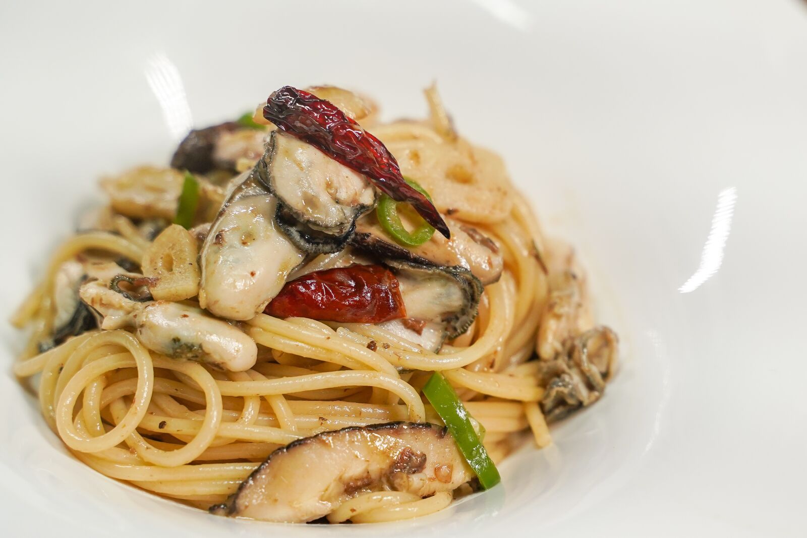 Sony a7 III + Tamron 28-75mm F2.8 Di III RXD sample photo. Oyster, pasta, anchovies photography