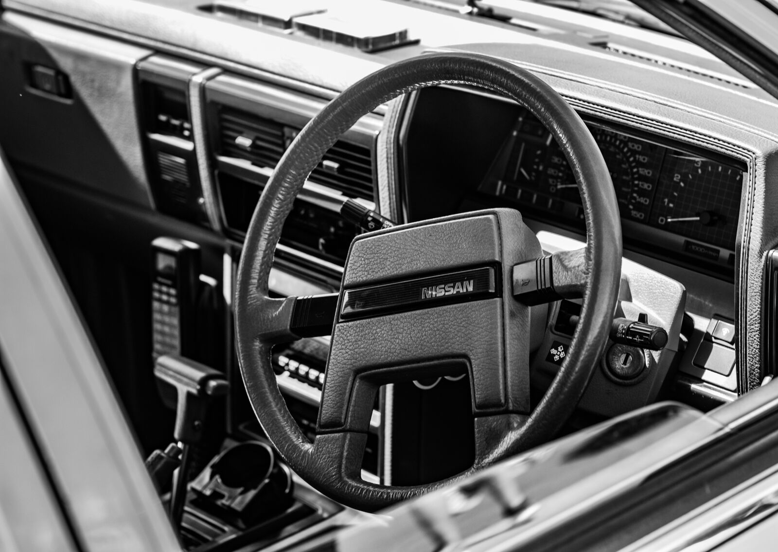 Canon EOS 70D + Canon EF 50mm F1.4 USM sample photo. Steering wheel, car, auto photography