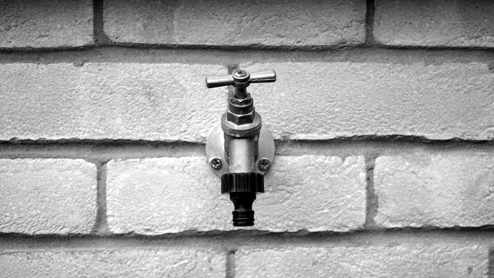 Sony a7 sample photo. Grayscale, of, metal, faucet photography