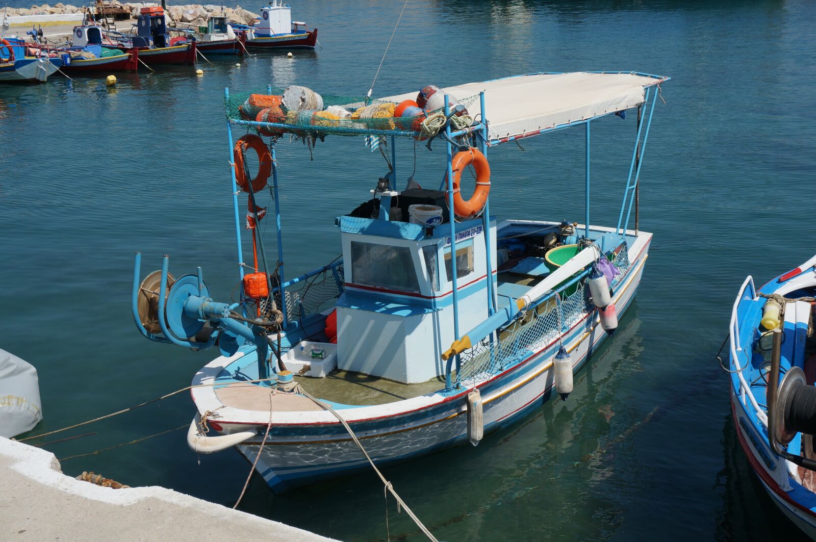 Sony Alpha NEX-5T sample photo. Greece, boat, sun photography