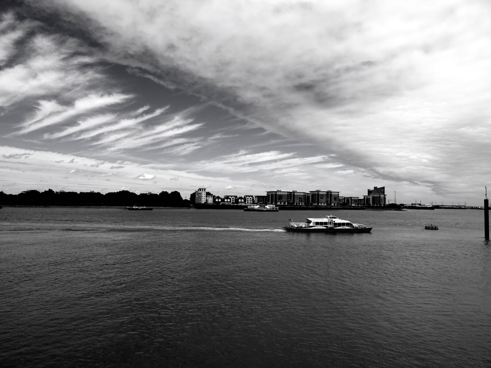 Sony DSC-HX60 sample photo. Boat, city, clouds, ocean photography