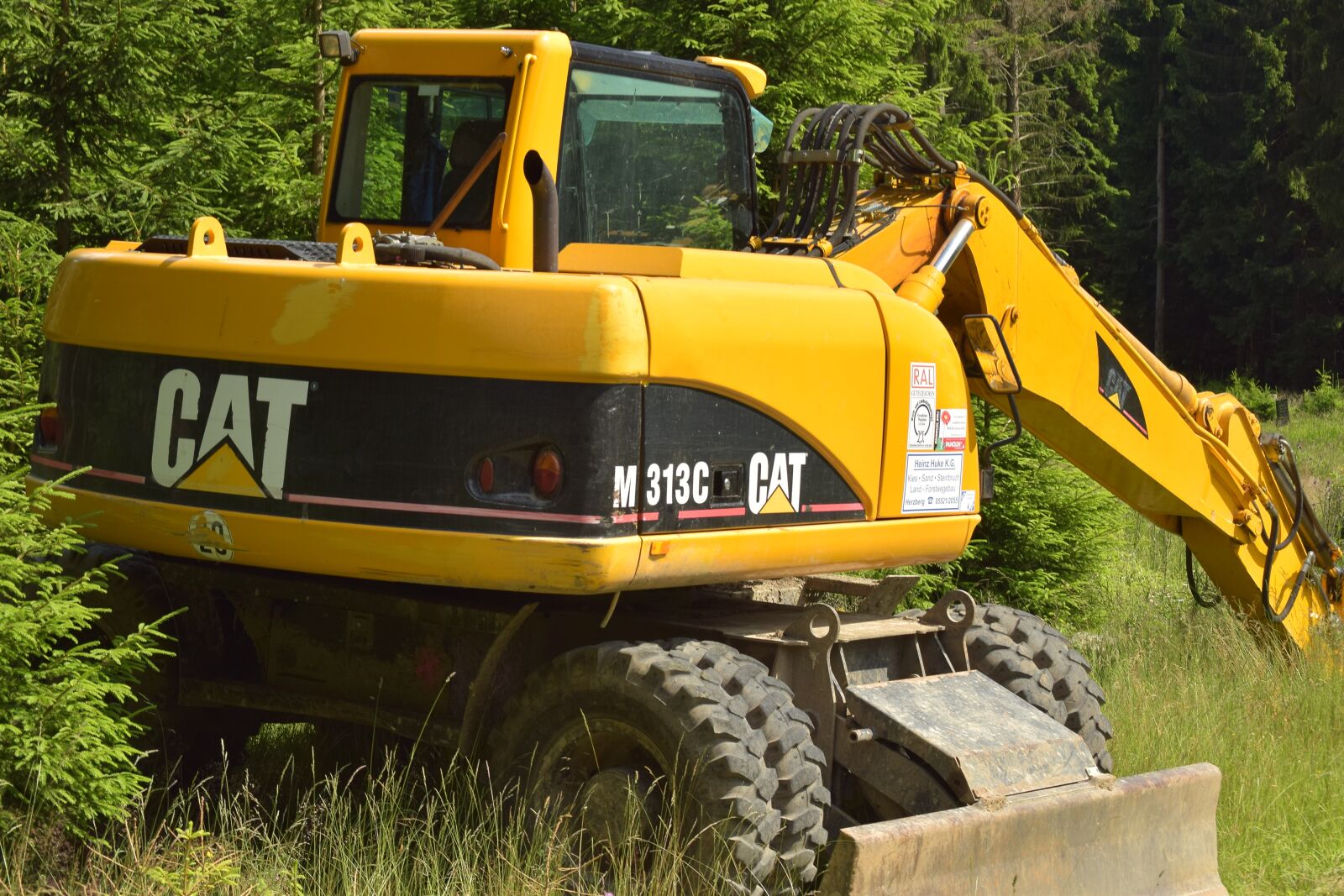 Nikon D5300 sample photo. Forestry vehicle, tree cases photography