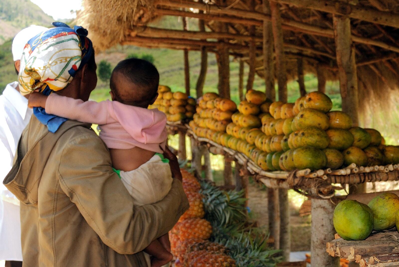 Nikon D60 sample photo. Female, holding, child, arms photography