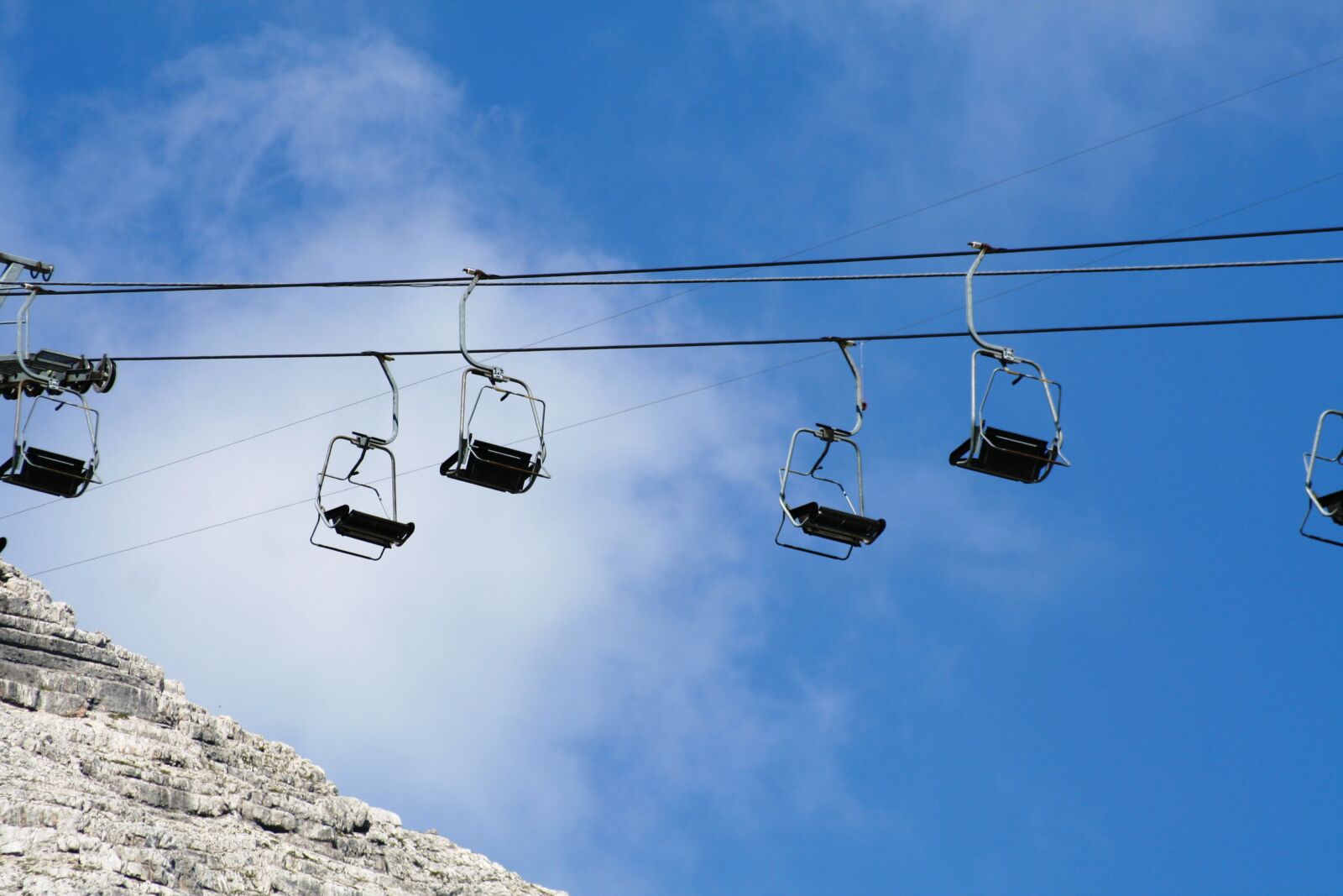 Canon EOS 350D (EOS Digital Rebel XT / EOS Kiss Digital N) sample photo. Chairlift, mountain, sky photography