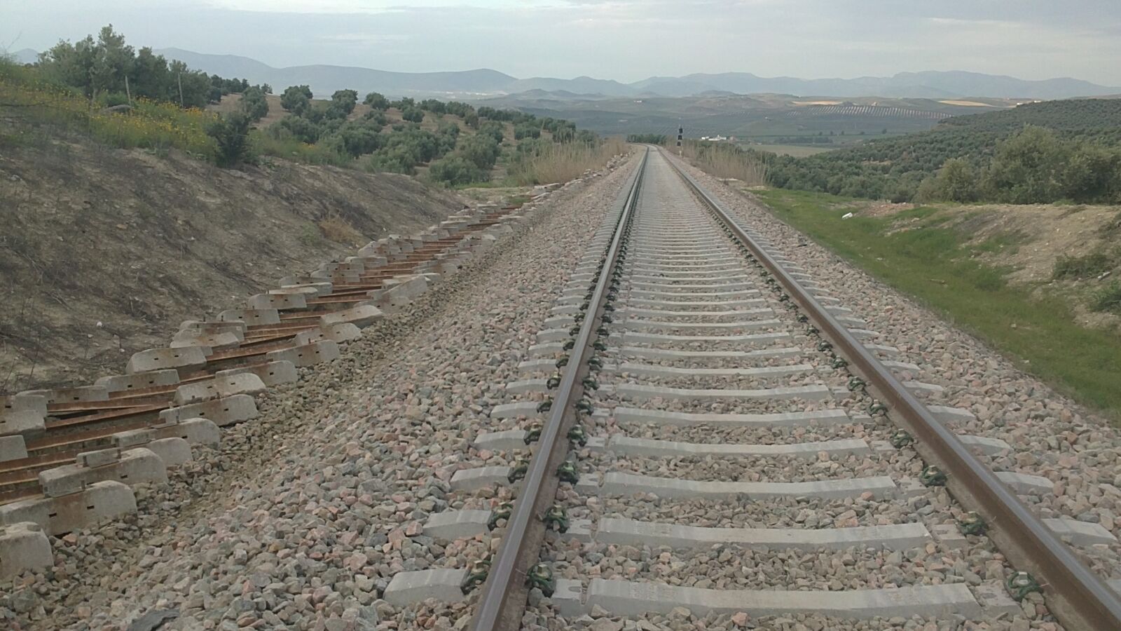 Sony Ericsson U5i sample photo. Train, sleepers, excavator photography