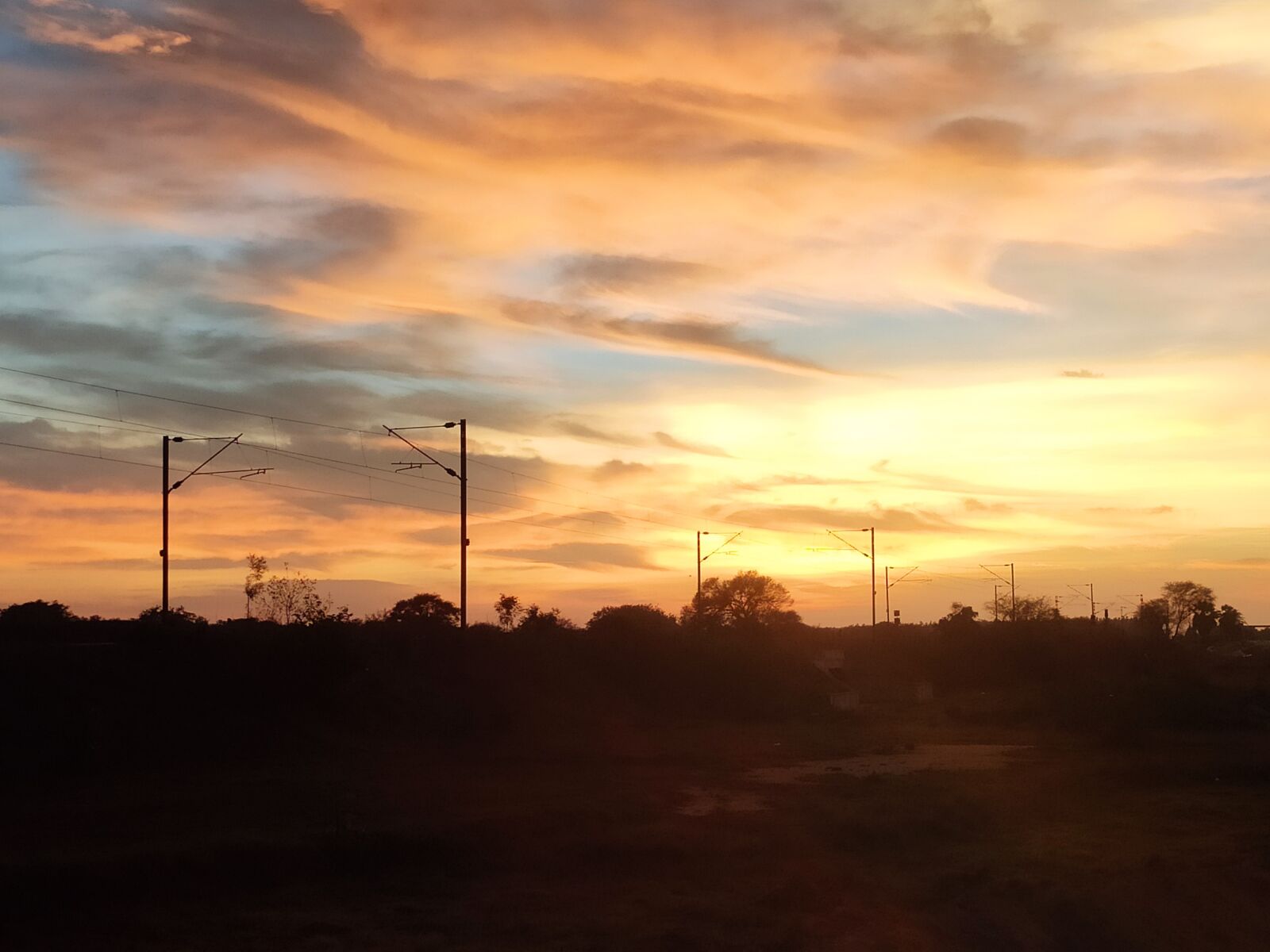 Xiaomi Redmi Note 7 Pro sample photo. Sunset, rail line, natural photography