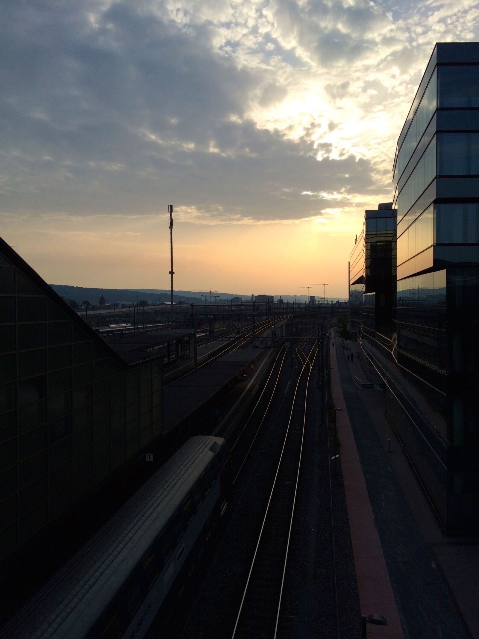 iPhone 5s back camera 4.15mm f/2.2 sample photo. Sunset, switzerland, tracks, train photography