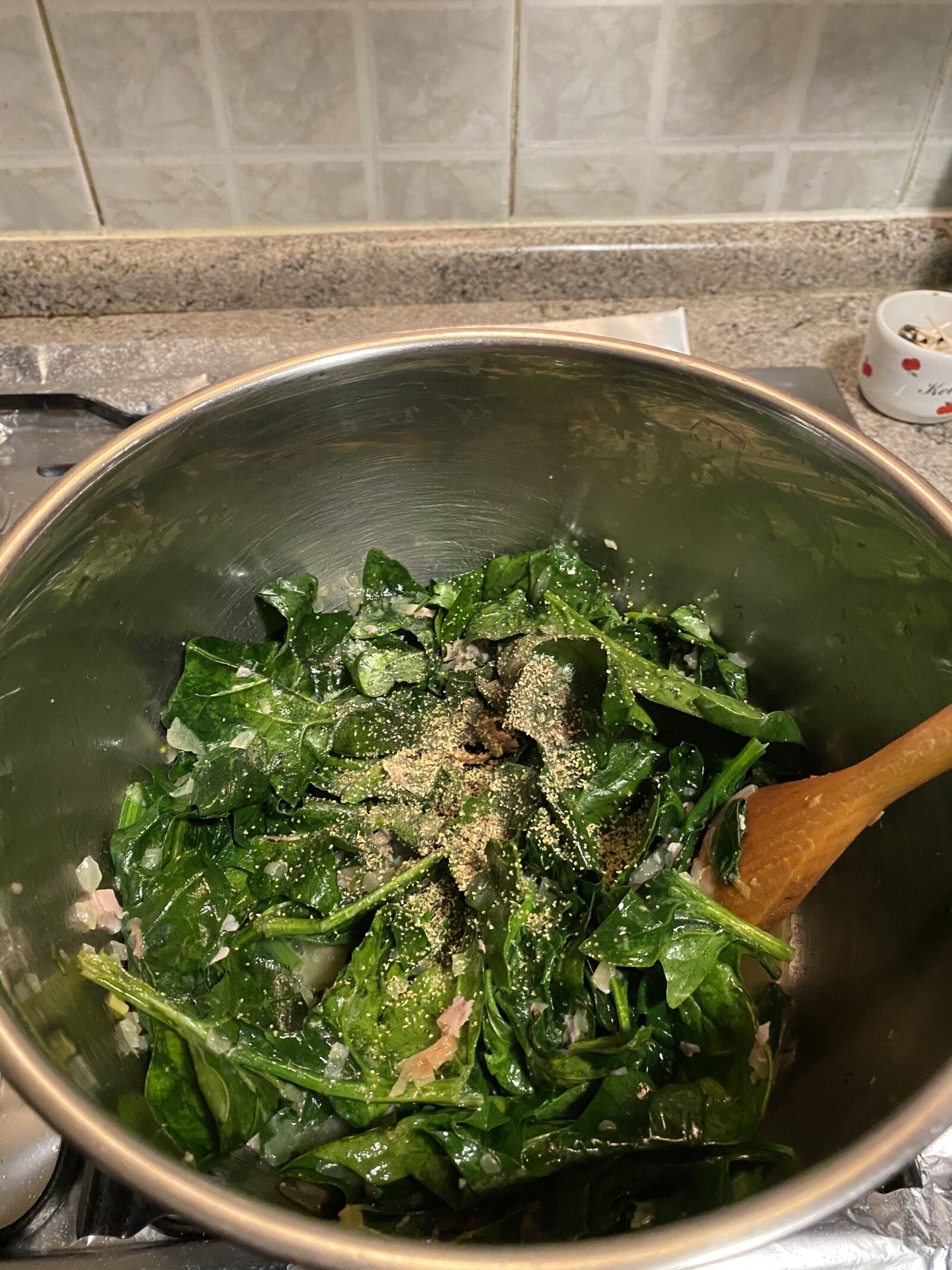 Apple iPhone 11 sample photo. Cook, spinach, kitchen photography
