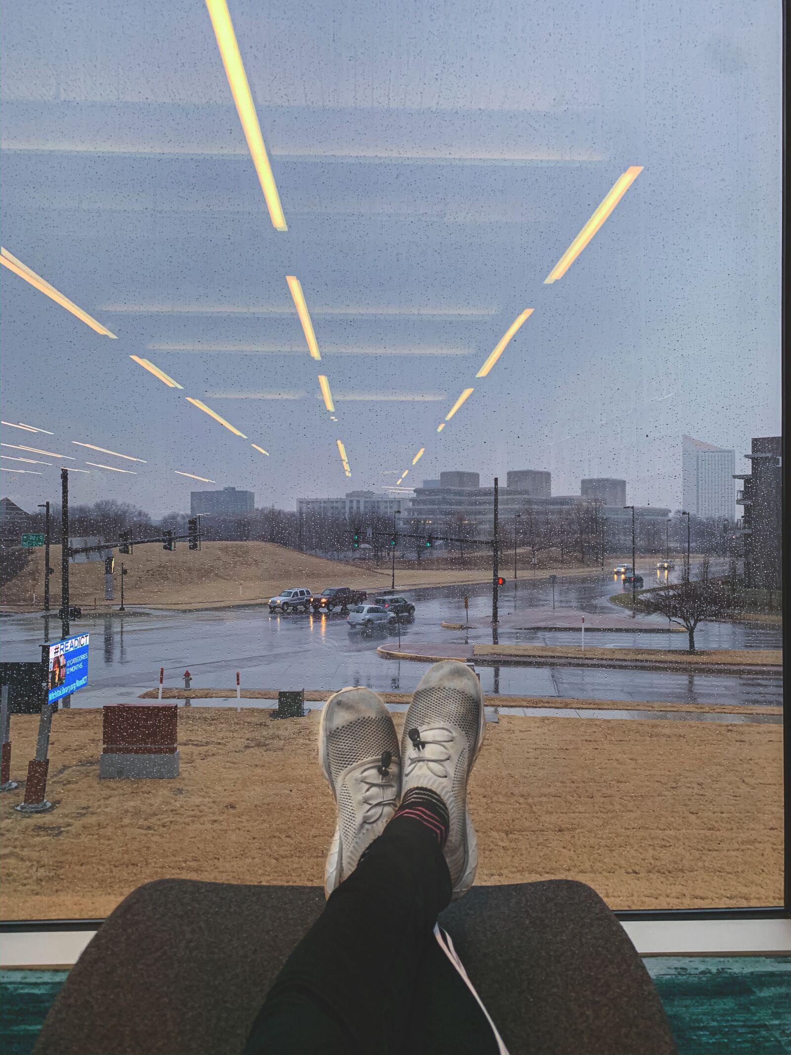 Apple iPhone XS sample photo. Shoes, reflection, city photography