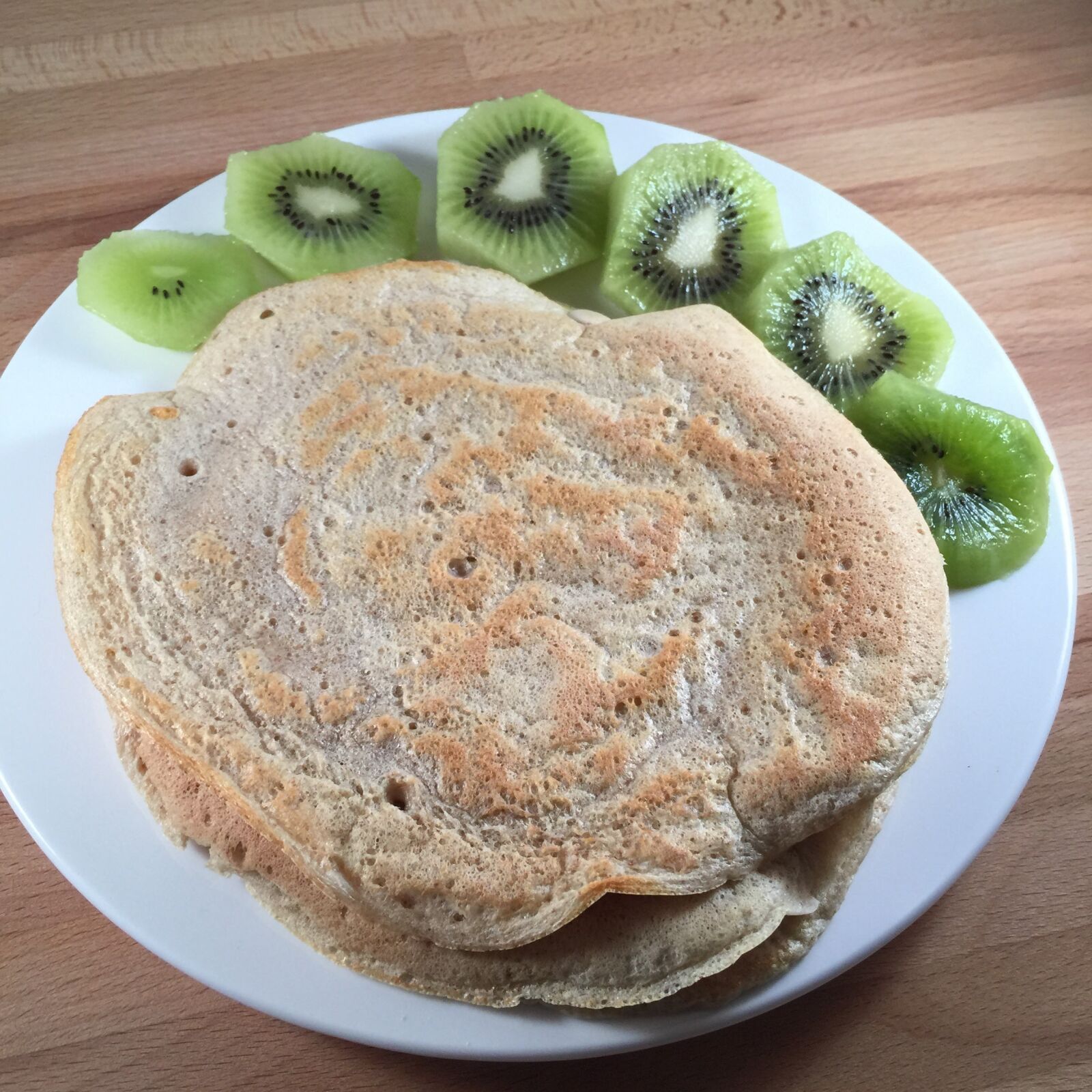 iPhone 6 Plus back camera 4.15mm f/2.2 sample photo. Pancake, kiwi, breakfast photography