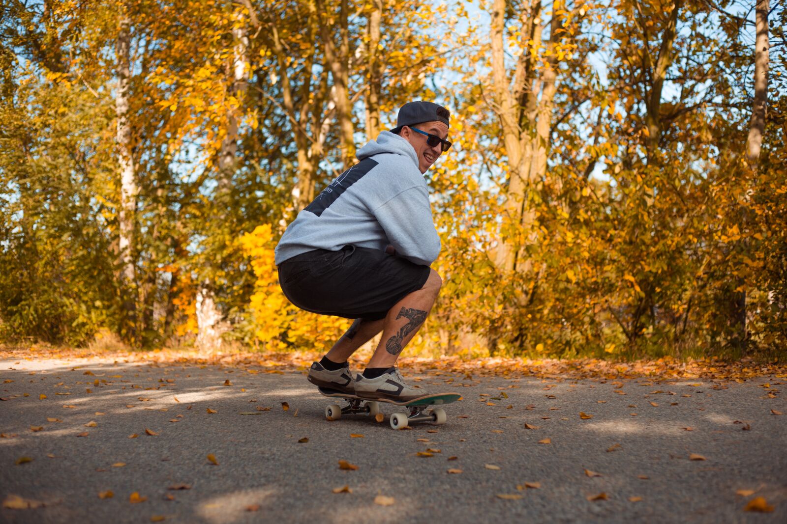 Canon EF 50mm F1.8 II sample photo. Skateboard, man, autumn photography