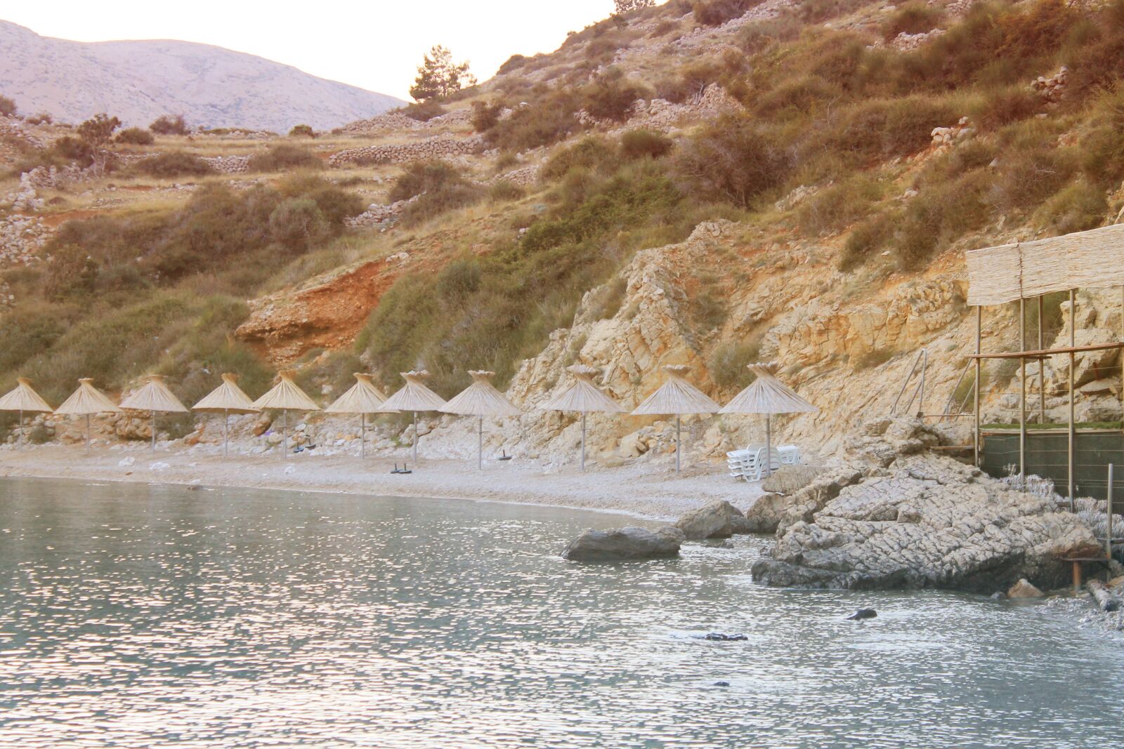 Canon EOS 1100D (EOS Rebel T3 / EOS Kiss X50) sample photo. Beach, umbrella, rocky photography