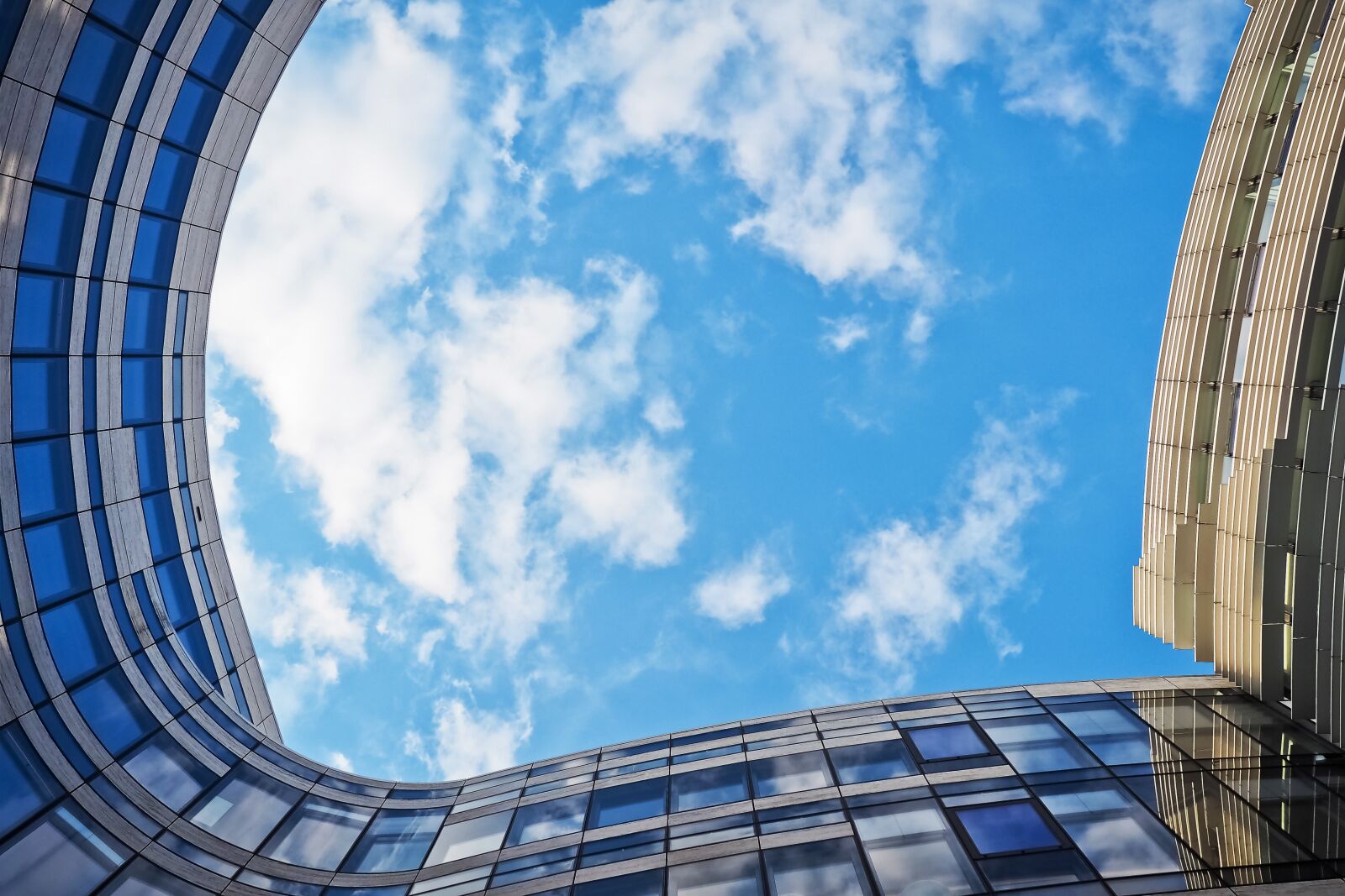 Olympus OM-D E-M10 sample photo. Architecture, glass, modern photography