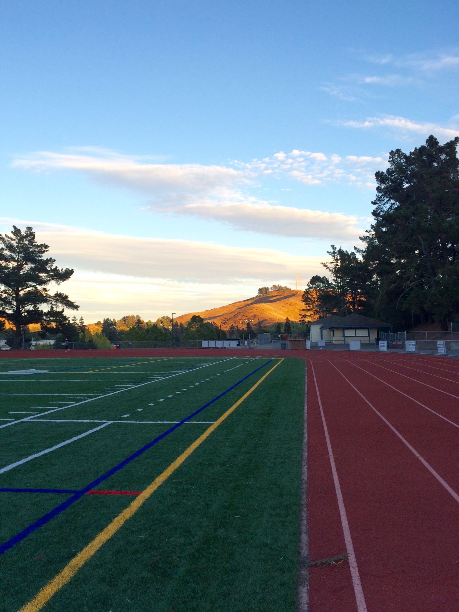 iPhone 5s back camera 4.15mm f/2.2 sample photo. Track and field, sunset photography