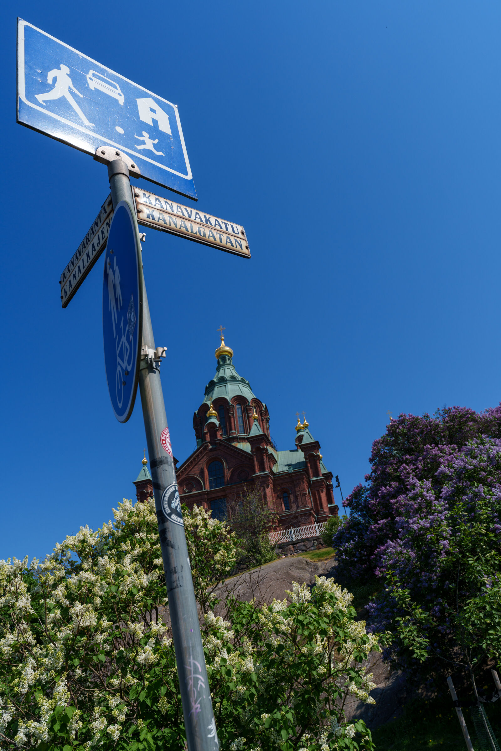 Sony a7R V sample photo. Sign by the church photography