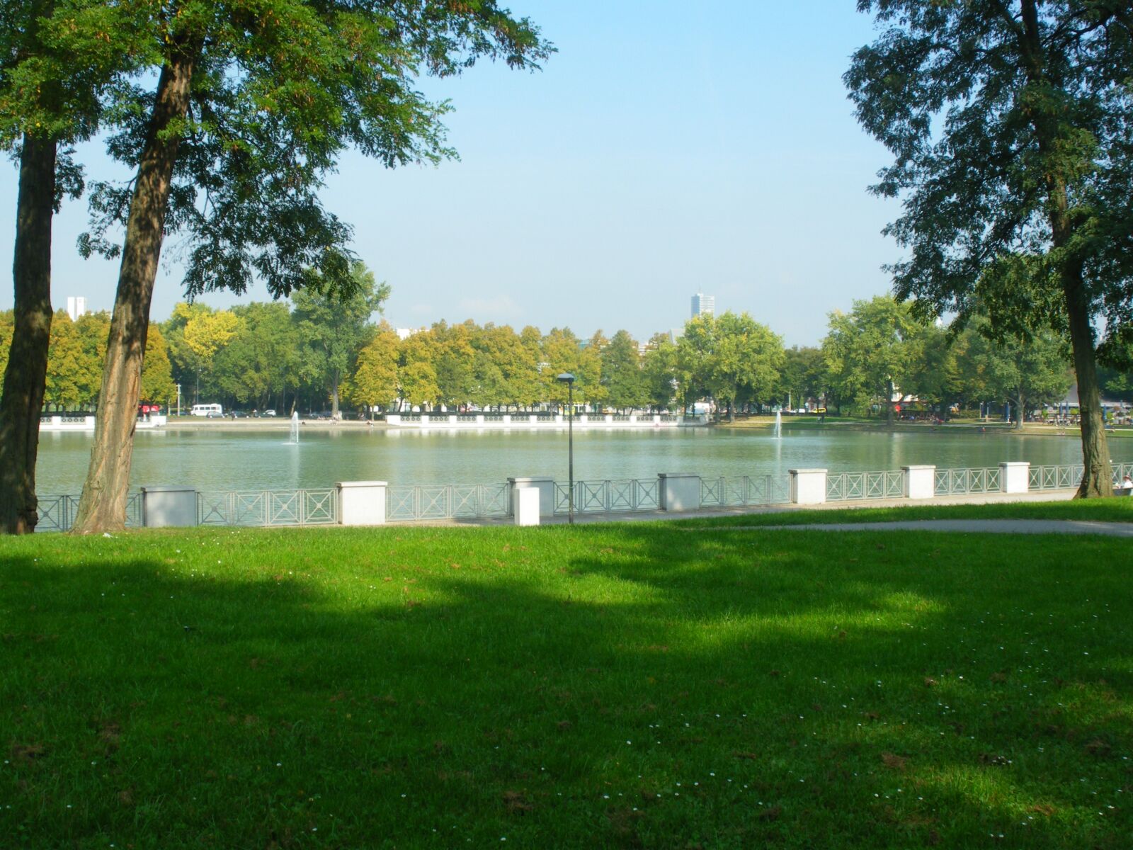 Pentax Optio M50 sample photo. Pond, water, city photography