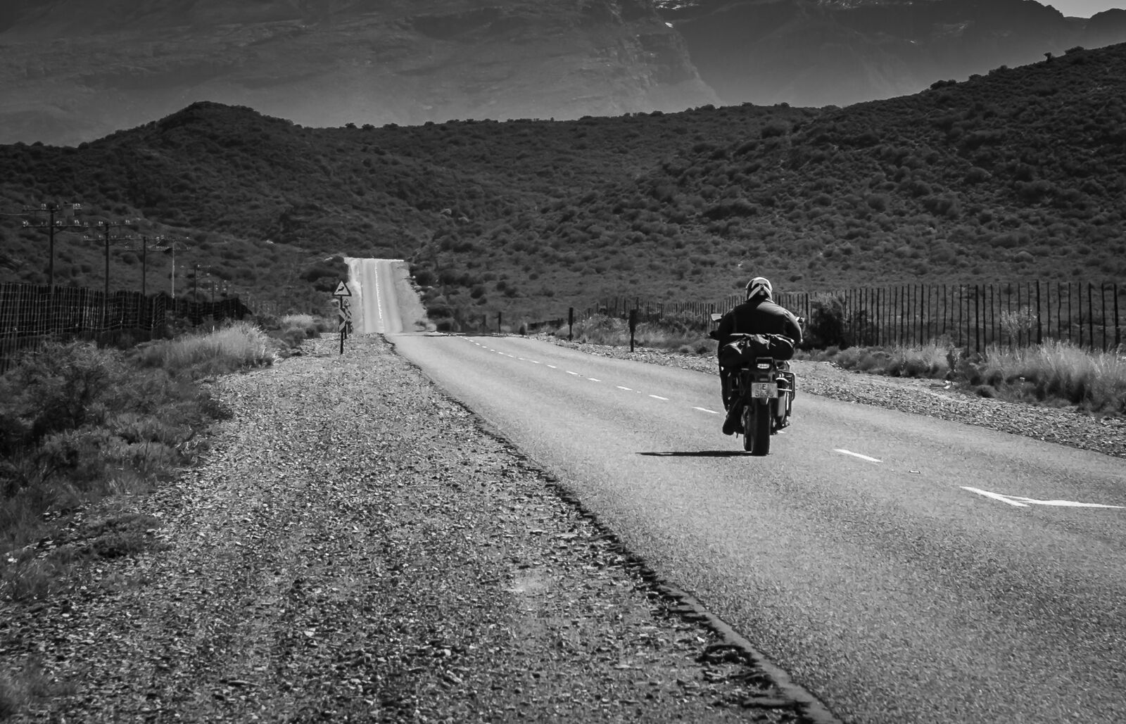 Nikon D750 sample photo. Road, black white, motorcyclist photography