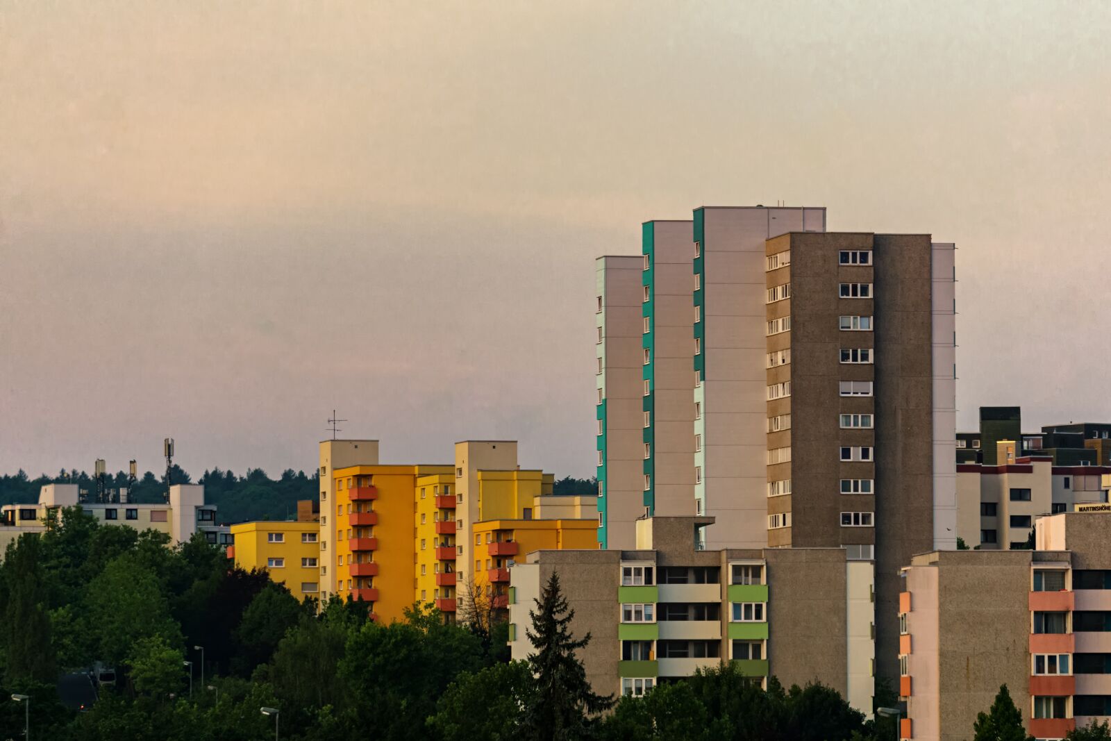 Sony E 55-210mm F4.5-6.3 OSS sample photo. Town, buildings, colors photography