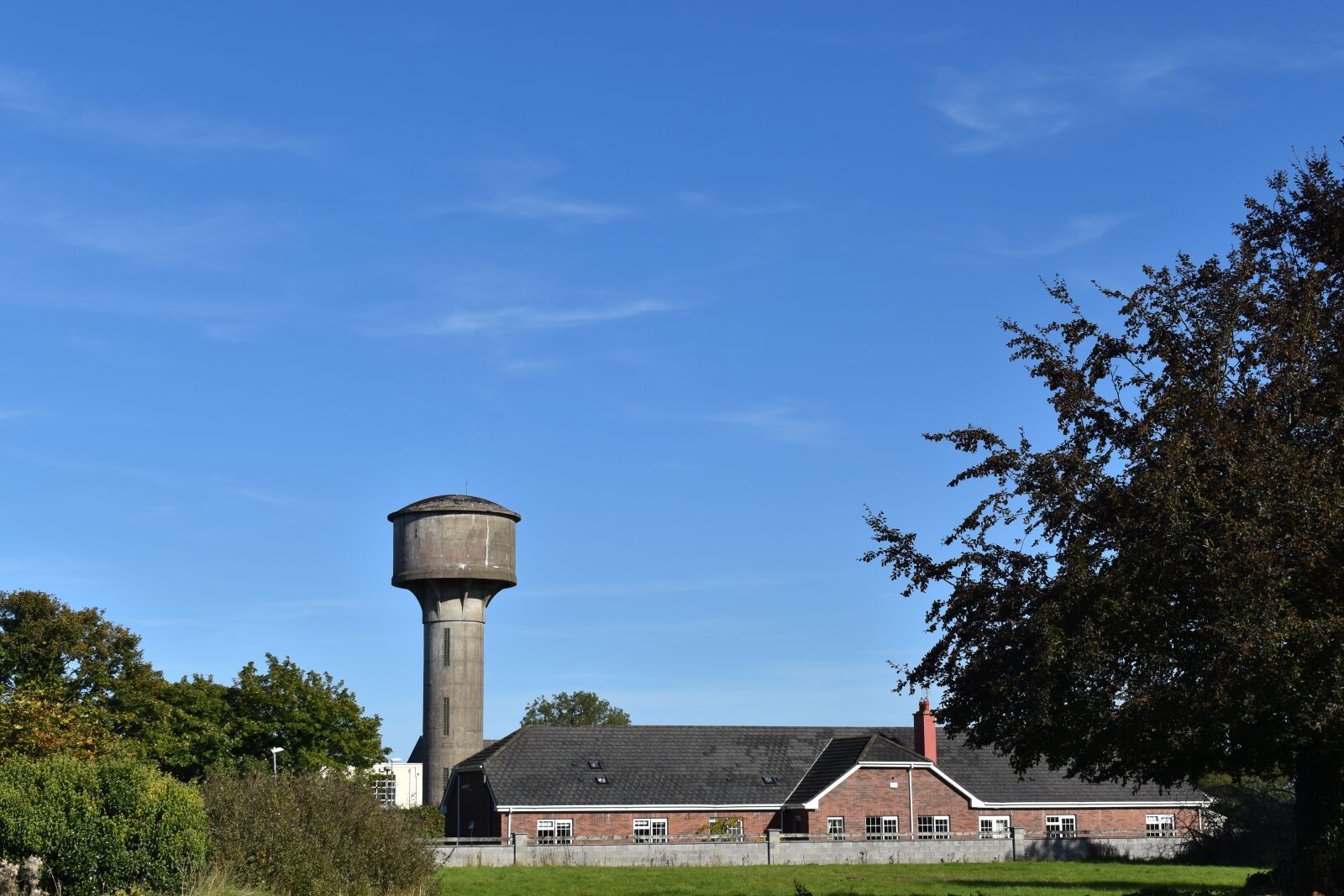 Nikon D3500 sample photo. Water tower, clear sky photography